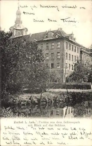 Ak Zerbst in Anhalt, Partie aus dem Schlosspark mit Blick zum Schloss