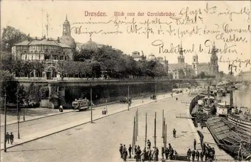 Ak Dresden Altstadt, Blick von der Carolabrücke, Schiffe, Anleger, Straßenbahnen