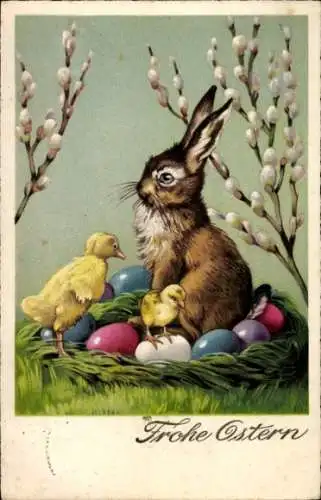 Ak Frohe Ostern, Osterhase sitzt mit Ostereiern und Küken im Nest