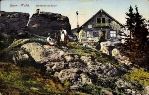 Ak Bayerisch Eisenstein in Niederbayern, Großer Arber, Arber Schutzhaus, Trachten, Felsen