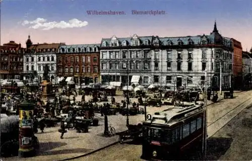 Ak Wilhelmshaven an der Nordsee, Bismarckplatz, Straßenbahn, Litfaßsäule