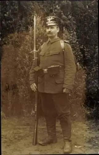 Foto Ak Munster, Truppenübungsplatz Munsterlager, Deutscher Soldat in Uniform, Bajonett, G. Heuer