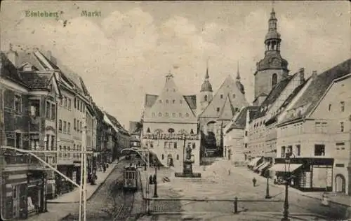 Ak Lutherstadt Eisleben in Sachsen Anhalt, Markt mit Andreaskirche, Lutherdenkmal, Straßenbahn