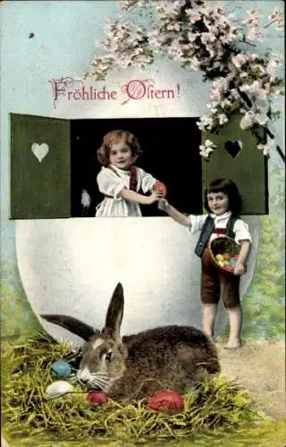 Ak Glückwunsch Ostern, Junge und Mädchen mit Ostereiern, Osterhase sitzt im Gras