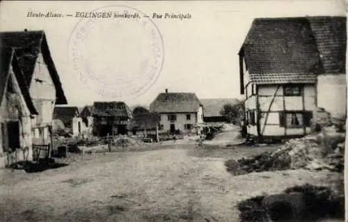 Ak Eglingen Elsass Haut Rhin, Rue Principale, Straßenpartie, Wohnhäuser, Trümmer, Zerstörung I.WK