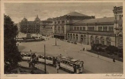 Ak Hannover in Niedersachsen, Am Bahnhof, Straßenbahn