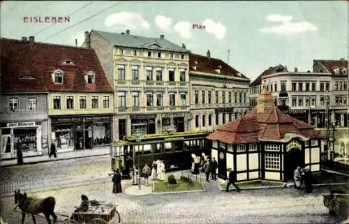 Ak Lutherstadt Eisleben, Plan, Straßenbahn, Geschäfte