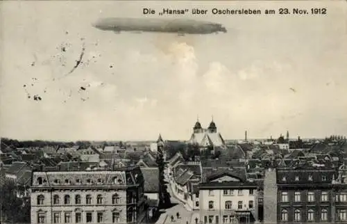 Ak Oschersleben an der Bode, Zeppelin Luftschiff Hansa über der Stadt, 23. Nov. 1912