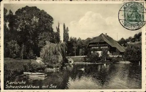 Ak Karlsruhe in Baden, Schwarzwaldhaus mit See