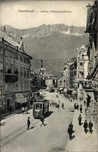 Ak Innsbruck in Tirol, Maria Theresienstraße, Straßenbahn, Bergpanorama