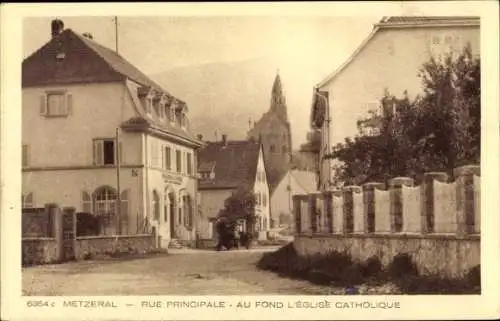 Ak Metzeral Elsass Haut Rhin, Rue Principale, Katholische Kirche