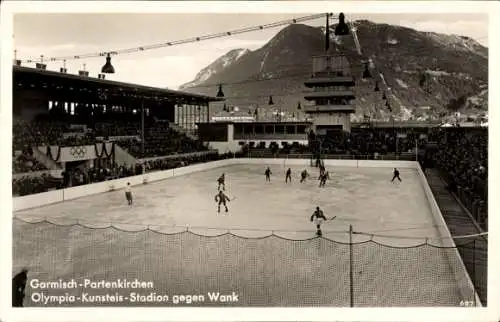 Ak Garmisch Partenkirchen in Oberbayern, Olympia-Kunsteis-Stadion gegen Wank