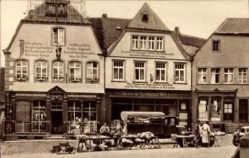 Ak Sankt Wendel Saarland, Häuser mit Bekenntnissprüchen am Domplatz, Marktstände