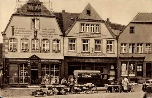 Ak Sankt Wendel Saarland, Häuser mit Bekenntnissprüchen am Domplatz, Marktstände