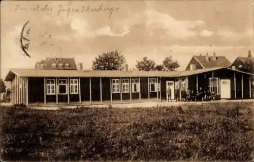 Ak Cuxhaven in Niedersachsen, Blick auf ein Haus, Bewohner, Familie, Gruppenfoto