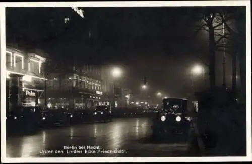 Foto Ak Berlin Mitte, Straße Unter den Linden bei Nacht