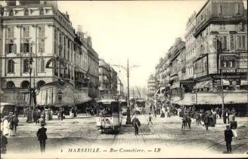 Ak Marseille Bouches du Rhône, Rue Cannebiere, Passanten, Straßenbahnen