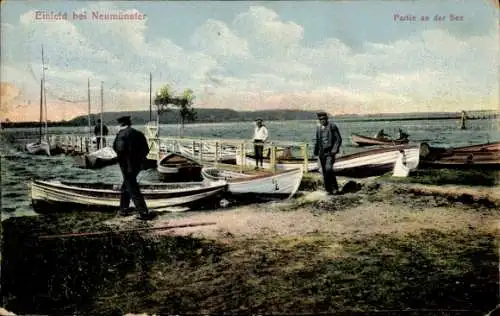 Ak Einfeld Neumünster in Holstein, an der See, Boote, Männer