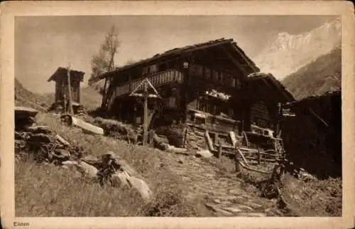 Ak Eisten im Lötschental Kanton Wallis, Holzhütte, Berge