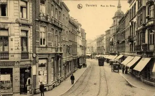 Ak Verviers Wallonien Lüttich, Rue du Brou, Straßenpartie in der Stadt, Straßenbahn, Buchhandlung