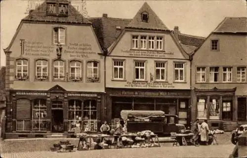 Ak Sankt Wendel Saarland, Häuser mit Bekenntnissprüchen am Domplatz, Marktstände