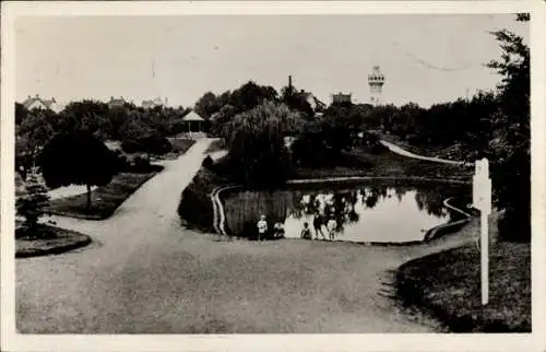 Ak Quessy-Tergnier Aisne, Coin des Buttes Chaumont, Park, Turm