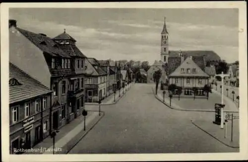 Ak Rothenburg in der Oberlausitz, Straßenpartie mit Kirche, Geschäftshäuser, Klempnerei Max Kapisch