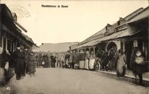 Ak Kowel Ukraine, Marktstraße, Passanten, Pferdewagen