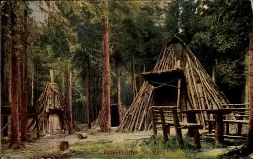 Ak Harz, Köhlerhütten aus Holz im Wald, Sitzbänke