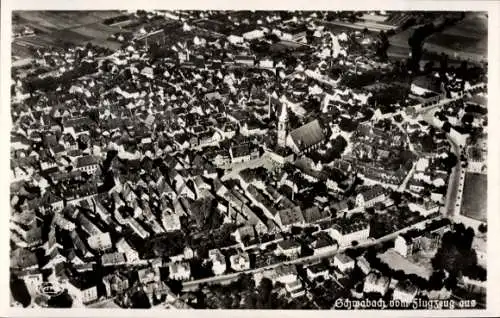 Ak Schwabach in Mittelfranken Bayern, Stadt Schwabach von oben, ein Flugzeug ist am Himmel zu ...