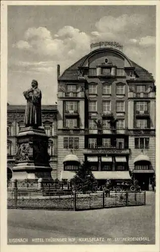 Ak Lutherstadt Eisenach in Thüringen. Hotel Thüringer Hof, Karlsplatz mit Lutherdenkmal