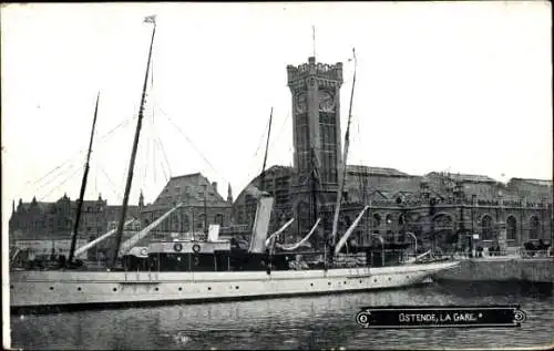 Ak Oostende Ostende Westflandern, Bahnhof, Hafenanlage, Schiffe, Uhrturm