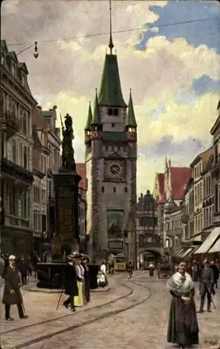 Künstler Ak Hoffmann, H., Freiburg im Breisgau, Kaiserstraße mit Martinstor