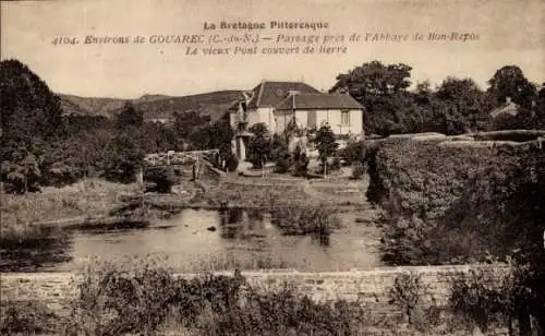 Ak Gouarec Côtes d'Armor, Paysage pres de l'Abbaye de Bon-Repos, Le vieux Pont couvert de lierre