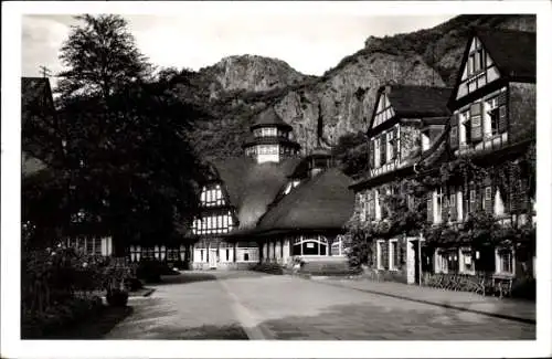 Ak Bad Münster am Stein Ebernburg, Straßenpartie, Fachwerkhäuser, Felsen