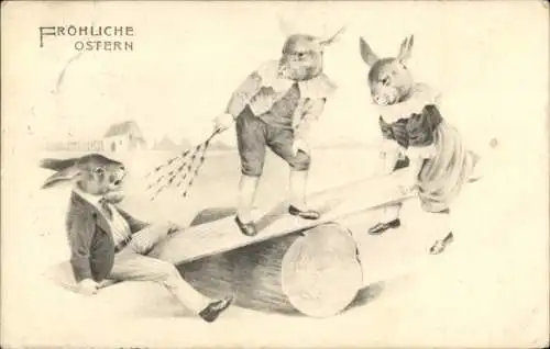 Künstler Ak Frohe Ostern, Osterhasen auf der Wippe