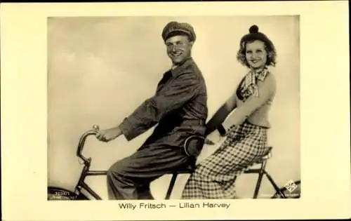 Ak Schauspielerin Lilian Harvey und Schauspieler Willy Fritsch, Fahrrad, Tandem