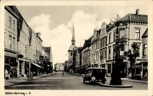 Ak Oldenburg im Großherzogtum Oldenburg, Straßenpartie, Auto, Kirche, Geschäfte