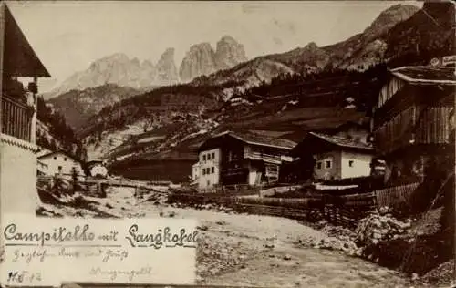 Foto Ak Campitello di Fassa Trentino, Straße, Häuser, Gebirge