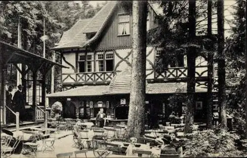 Ak Wernigerode im Harz, Hotel Steinerne Renne in  davor eine Terrasse mit Tischen und Stühlen,...