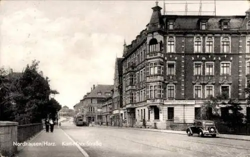 Ak Nordhausen in Thüringen, Geschäfte, Straßenbahn, Karl Marx Straße