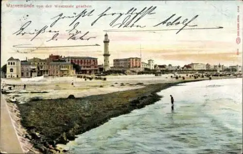 Ak Ostseebad Warnemünde Rostock, von der Westmole gesehen, Leuchtturm, Strand