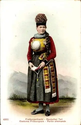 Ak Schweiz, Freiburg, Frau in Tracht, Bibel, Steckhut
