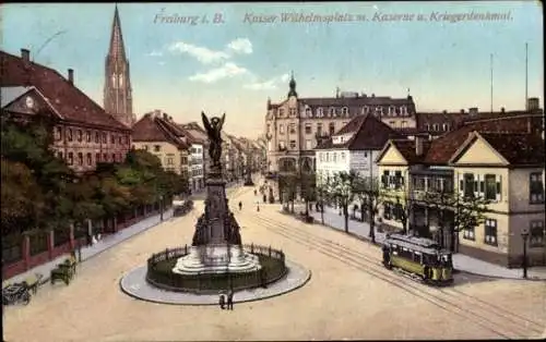 Ak Freiburg im Breisgau, Kaiser Wilhelmsplatz, Kaserne, Kriegerdenkmal, Straßenbahn