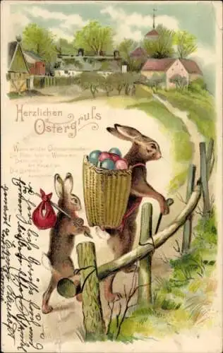 Präge Ak Glückwunsch Ostern, Osterhasen tragen Korb mit Ostereiern, Osterspruch