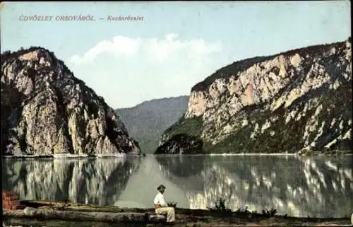 Ak Orșova Rumänien, Kazánrézlet, Mann blickt aufs Wasser, Berge