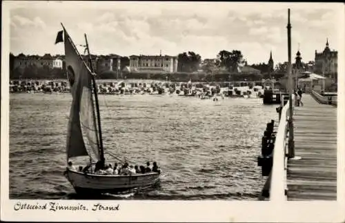 Ak Ostseebad Zinnowitz auf Usedom, Strand, Seebrücke, Segelboot