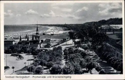 Ak Ostseebad Heringsdorf auf Usedom, Promenade und Brückeneingang