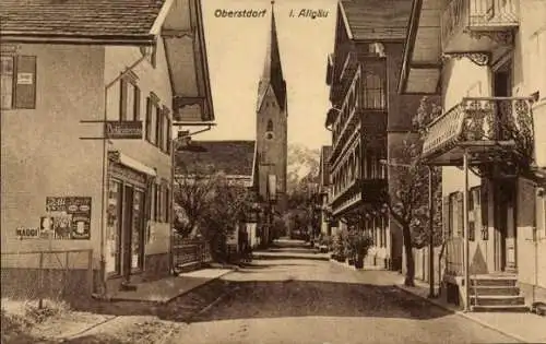 Ak Oberstdorf im Oberallgäu, Straßenpartie, Delikatessenladen