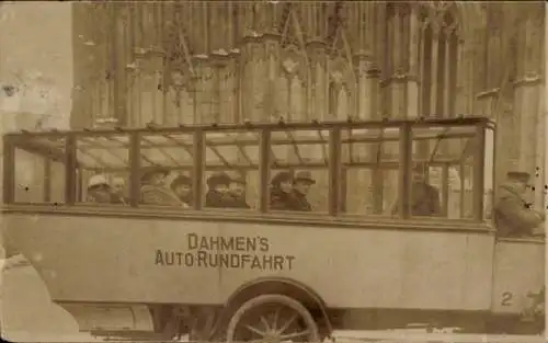 Foto Ak Dahmen's Auto-Rundfahrt, Stadtrundfahrt, Touristen